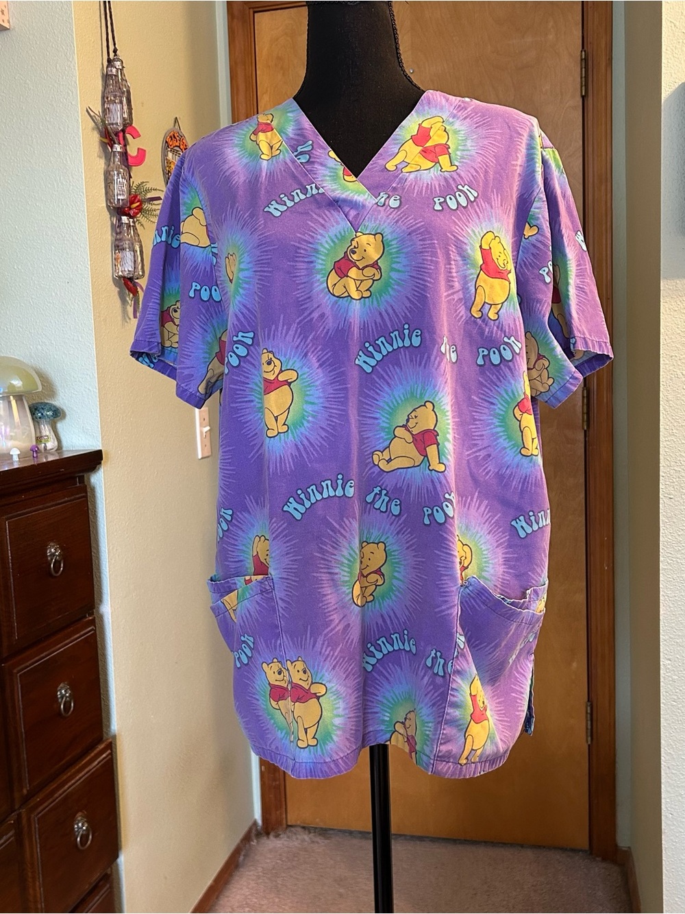 Disney Winnie the Pooh purple scrub top depicting various character poses size L